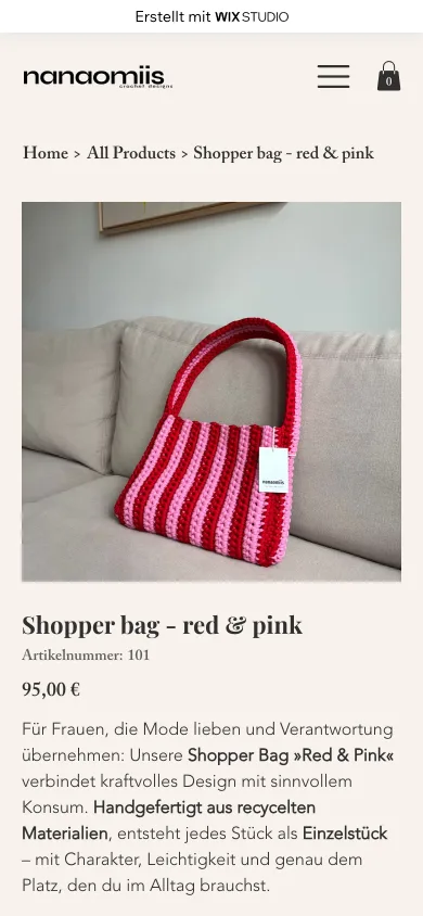Produktseite der rot und rosa gestreiften Shopper-Tasche auf dem Handy mit Foto, Preis und Beschreibungstext, Screenshot vom 27.10.2026